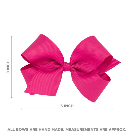 Wee Ones colorful confetti bow close-up showing sequins and glossy ribbon.