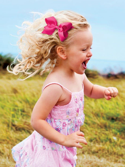 Wee Ones Divine Creations two-tone grosgrain bow showcases team spirit.