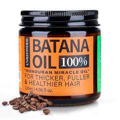 WEEMOTD Batana Oil bottle closeup for natural hair nourishment.