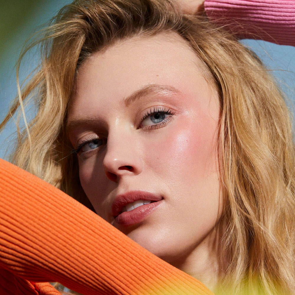 Sheer color and natural gloss from Well People Lip Butter SPF 15