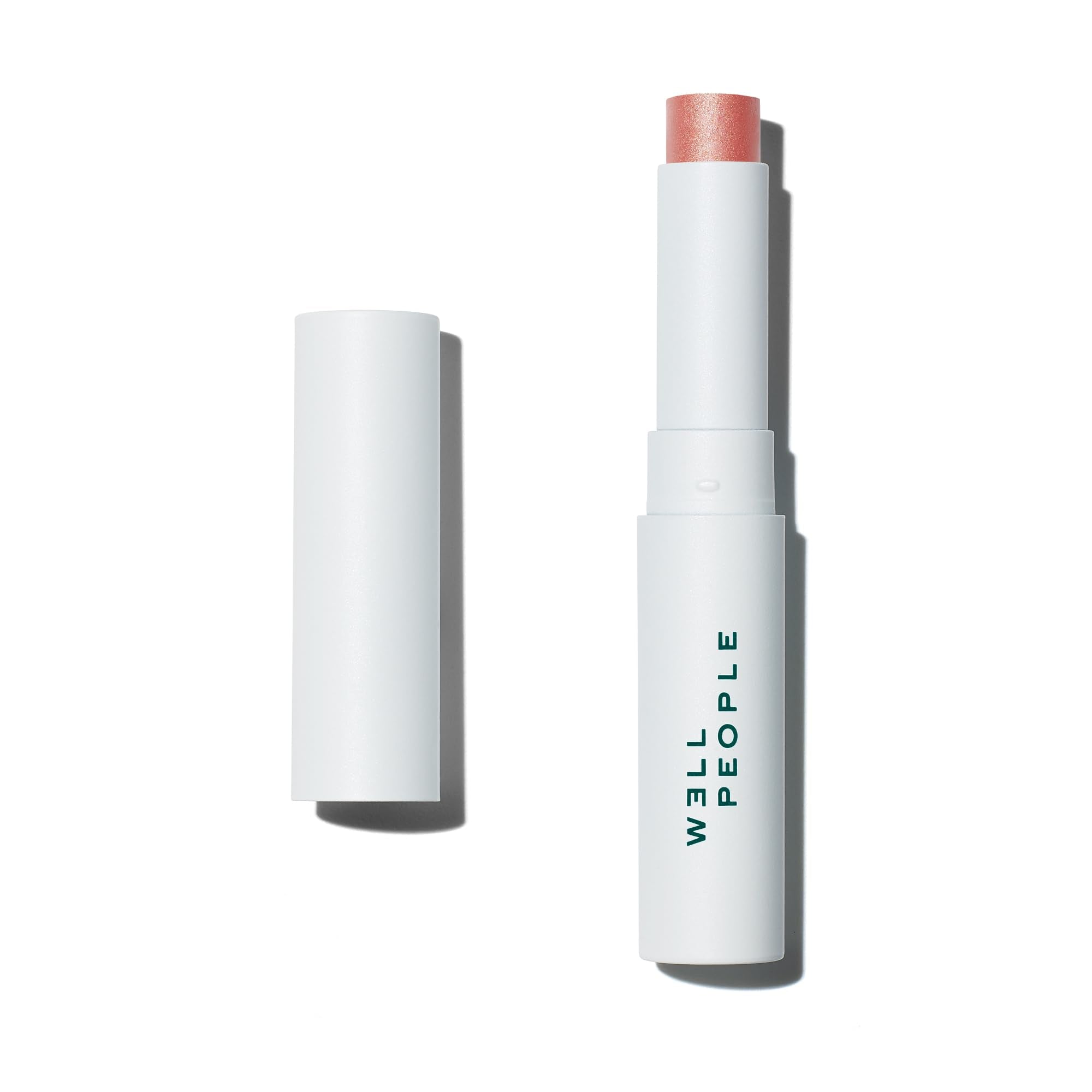 Well People Lip Butter SPF 15 tinted balm on lips offering sun protection and color