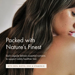 WelleCo The Hair Elixir dosage scene with two capsules