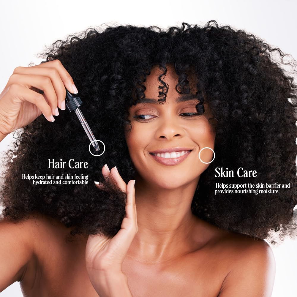 Well's Oil Aloe Vera Oil applied to hair to smooth frizz and add softness