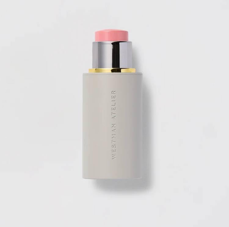 Westman Atelier Baby Cheeks Blush Stick Coquette swatch shows buildable pinky-peach glow.