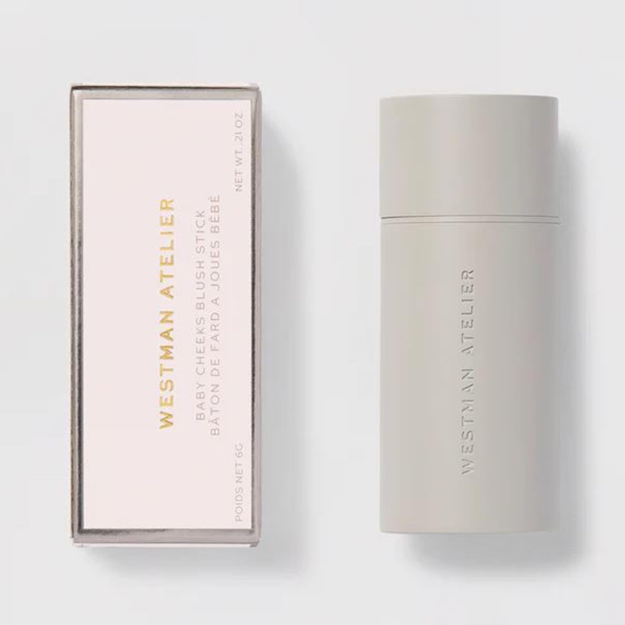 WESTMAN ATELIER Baby Cheeks Blush Stick Poppet on lips for subtle fullness.