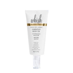 Whish Coconut Milk + Verbena Body Oil bottle close-up for radiant hydration