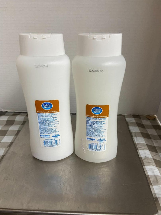 White Rain Coconut & Hibiscus conditioner bottle for smooth, manageable hair and tropical scent.