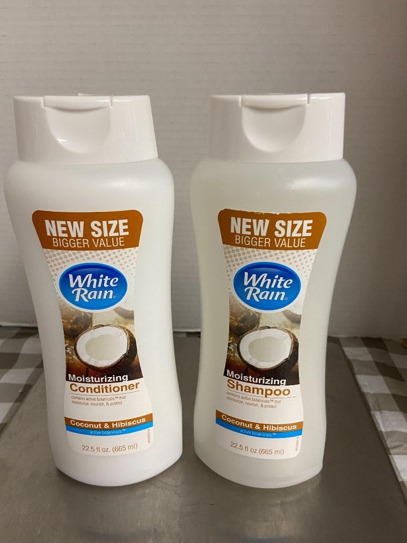 White Rain Coconut & Hibiscus shampoo bottle for tropical refreshment and all hair types.