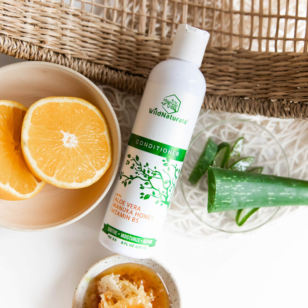 Wild Naturals eczema-friendly formula closeup, soothing scalp care.