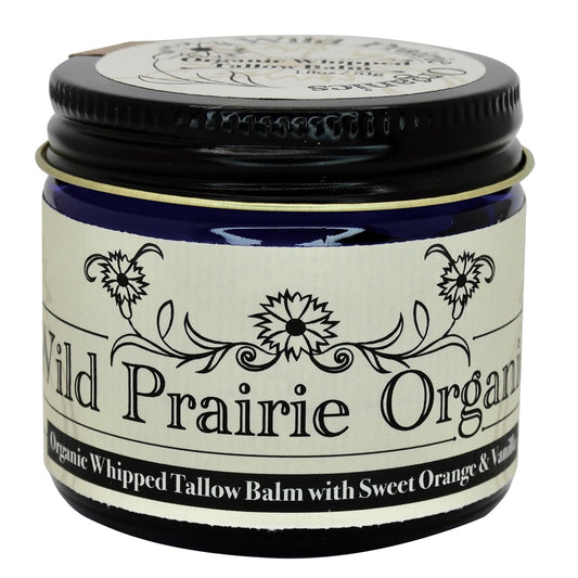 Wild Prairie Organics whipped tallow balm jar with Sweet Orange & Vanilla for daily hydration.