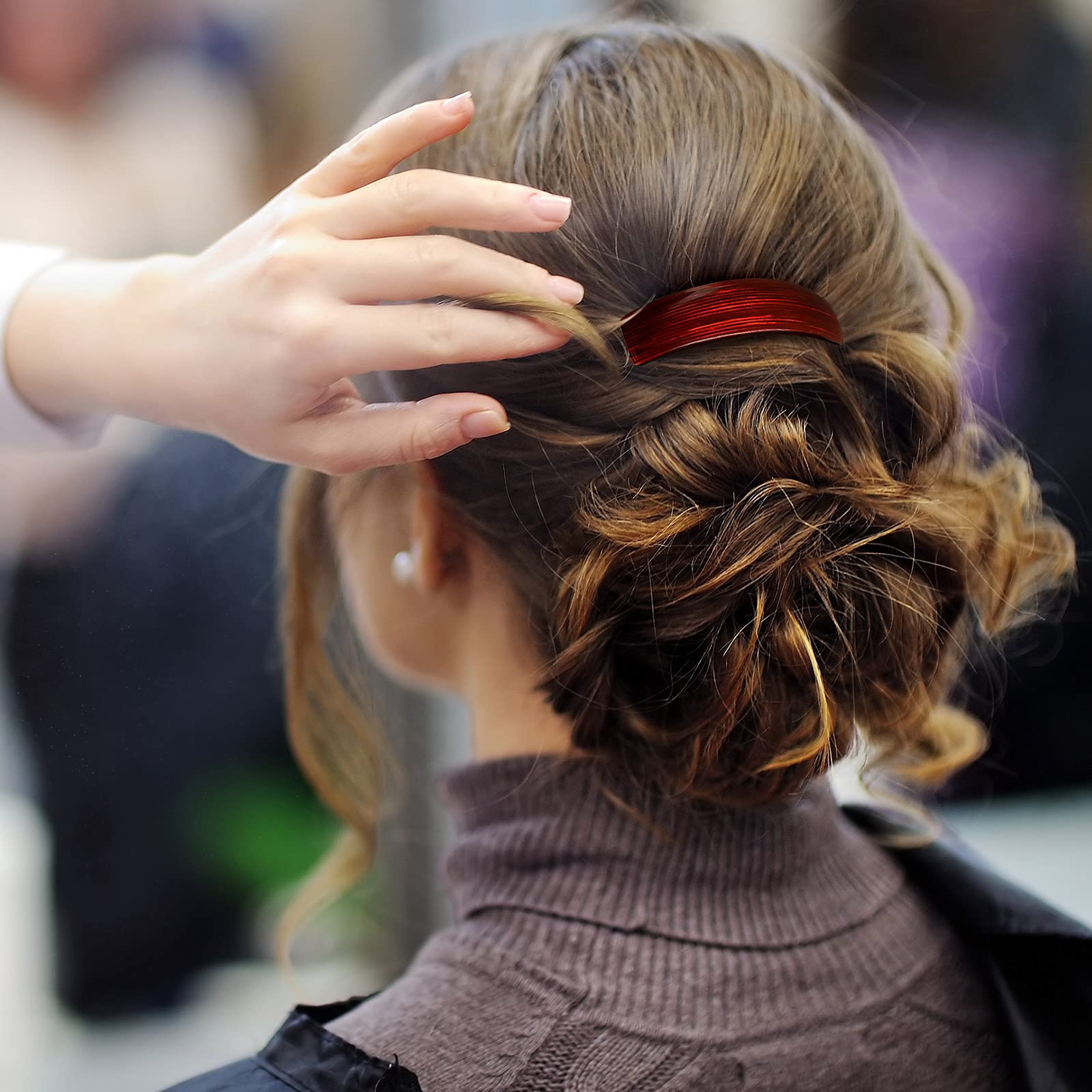WILLBOND large clip securing thick hair in an elegant updo.