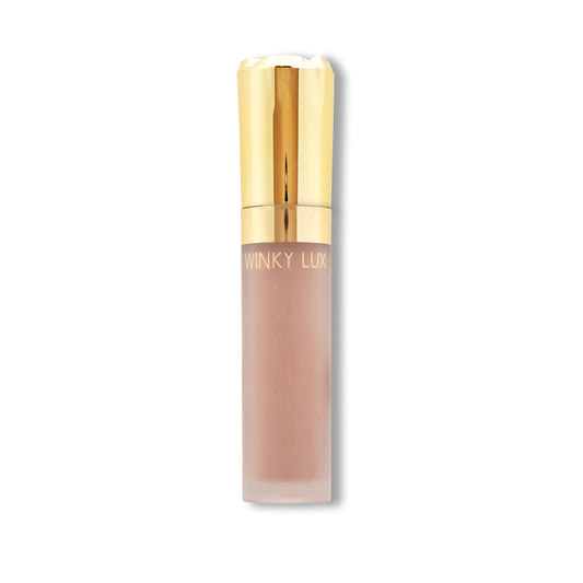 Winky Lux Rose Petal Liquid Eyeshadow on eyelids for long-lasting, crease-proof color.
