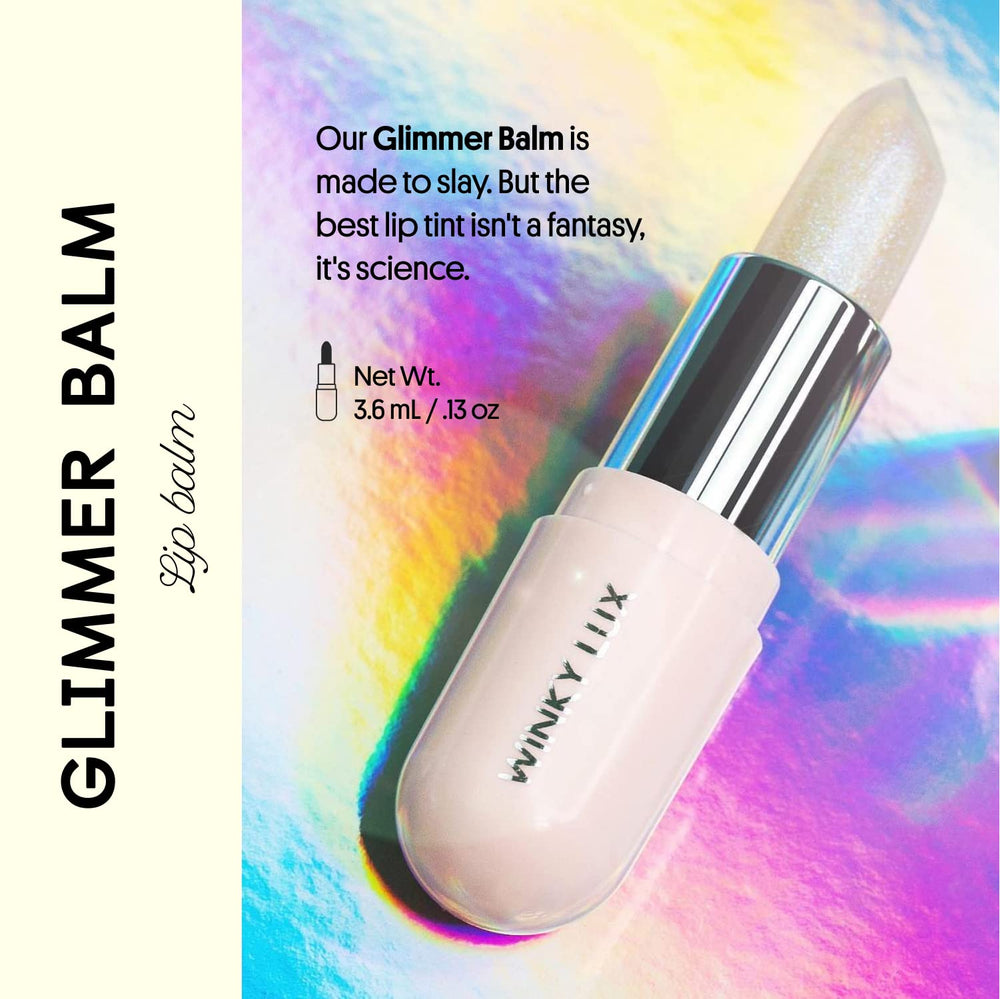 Winky Lux Rosé Glimmer Balm being applied to lips with pink tint.