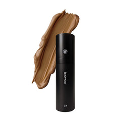 WOAK C4 bottle close-up showing tan shade for natural coverage