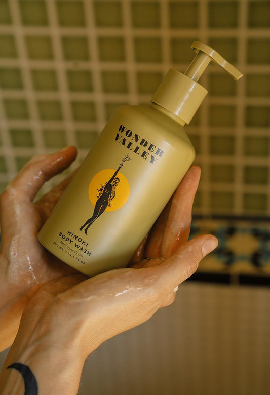 Wonder Valley Hinoki Body Wash pump dispensing silky lather for hydrated skin.