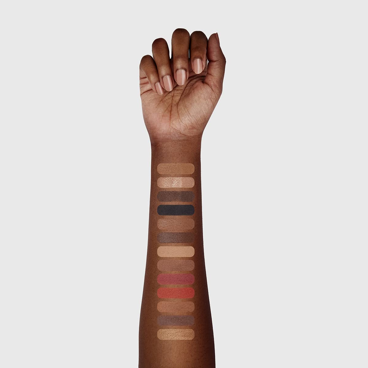 Woosh foundation powders and shimmering highlighter for a radiant finish