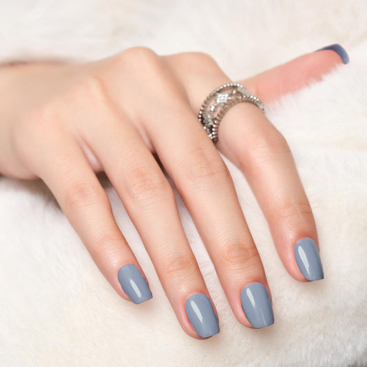 Close-up of Haze Blue nails on hand showing precise fit and shine