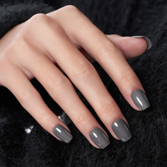 Wooyas press-on nails cement gray packaging, ready for quick at-home manicure.