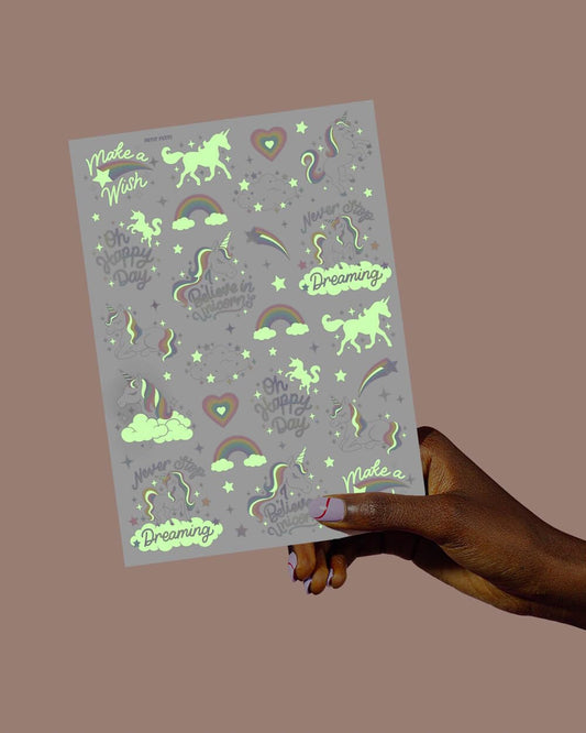 xo Fetti glow-in-the-dark tattoo sheet with unicorn designs