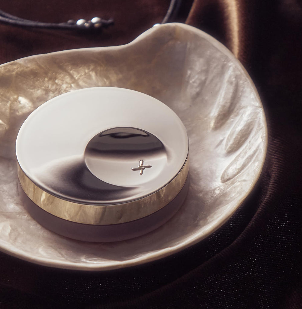 XOUL shell blush travel-size lip balm for quick touch-ups on the go.