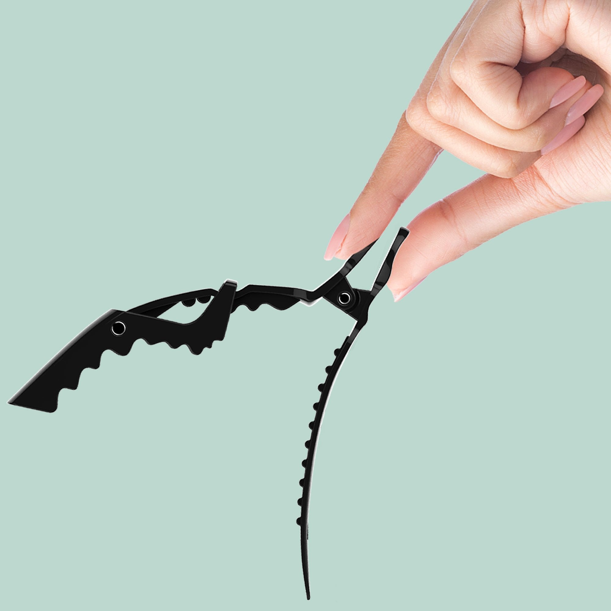 Xtava self-locking grip clip maintains hold without loosening during styling
