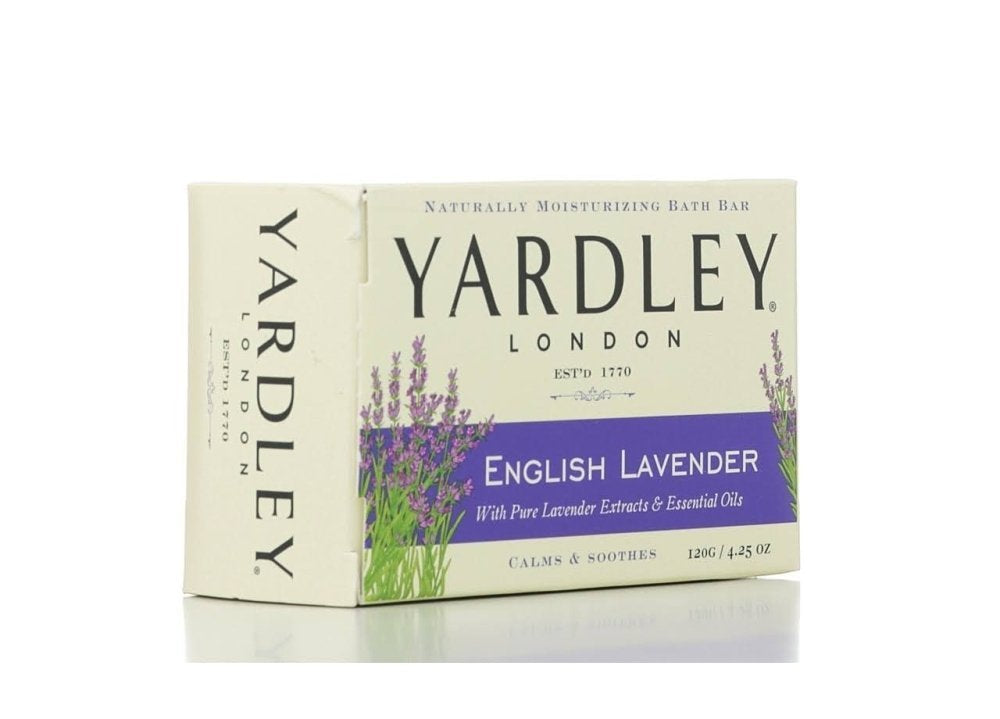 Yardley London moisturizing bar English Lavender with essential oils visible on a decorative bathroom shelf for daily hydration.
