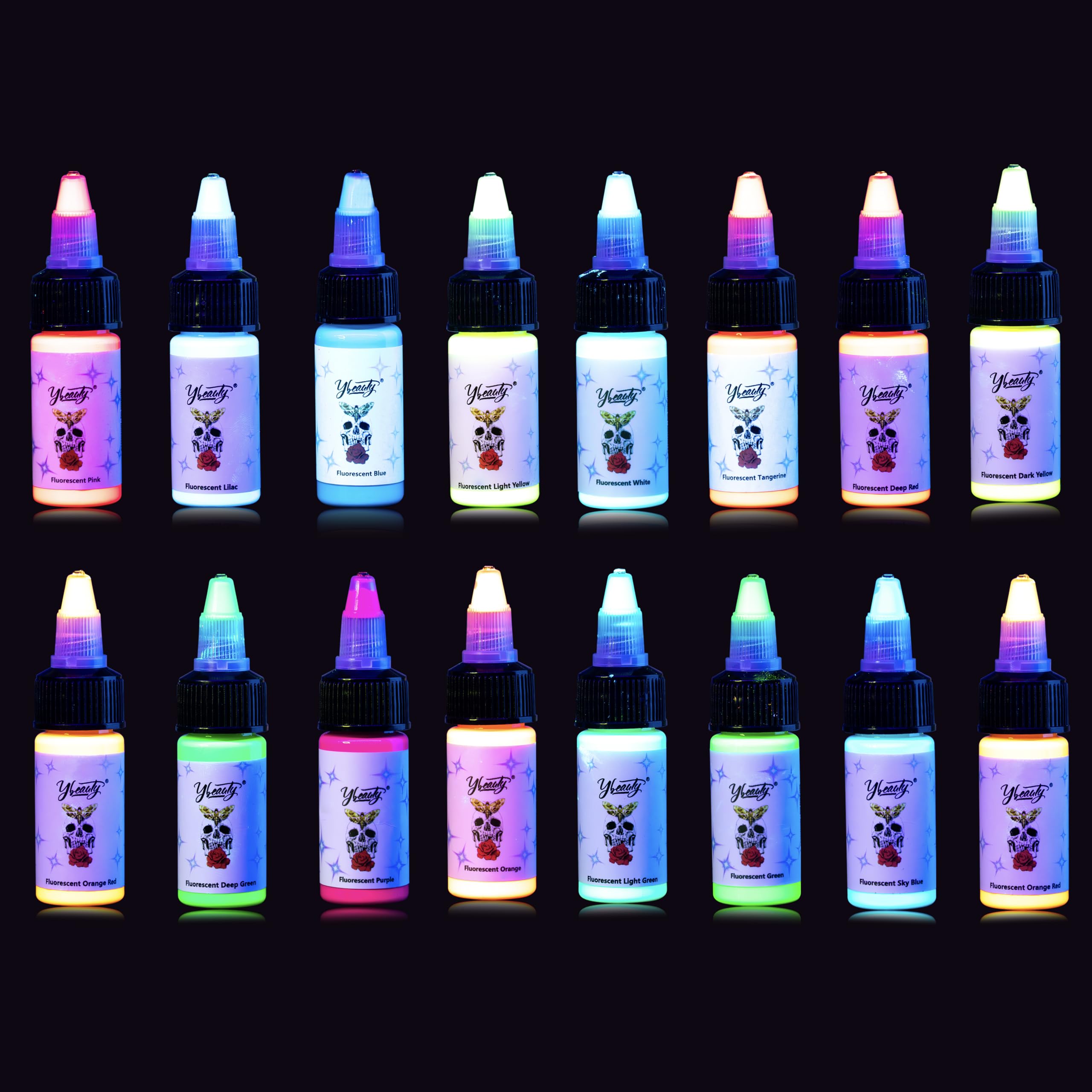 Ybeauty 16-color tattoo ink set glowing under UV light for vibrant designs.