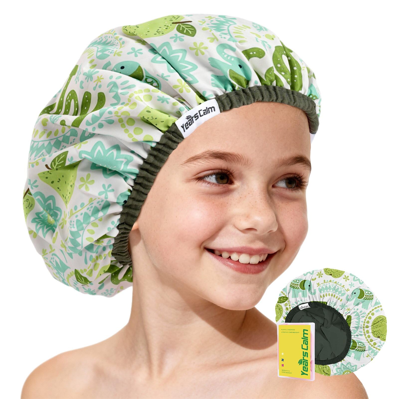 Years calm Kids Shower Cap with dino print offers waterproof protection during bath time.