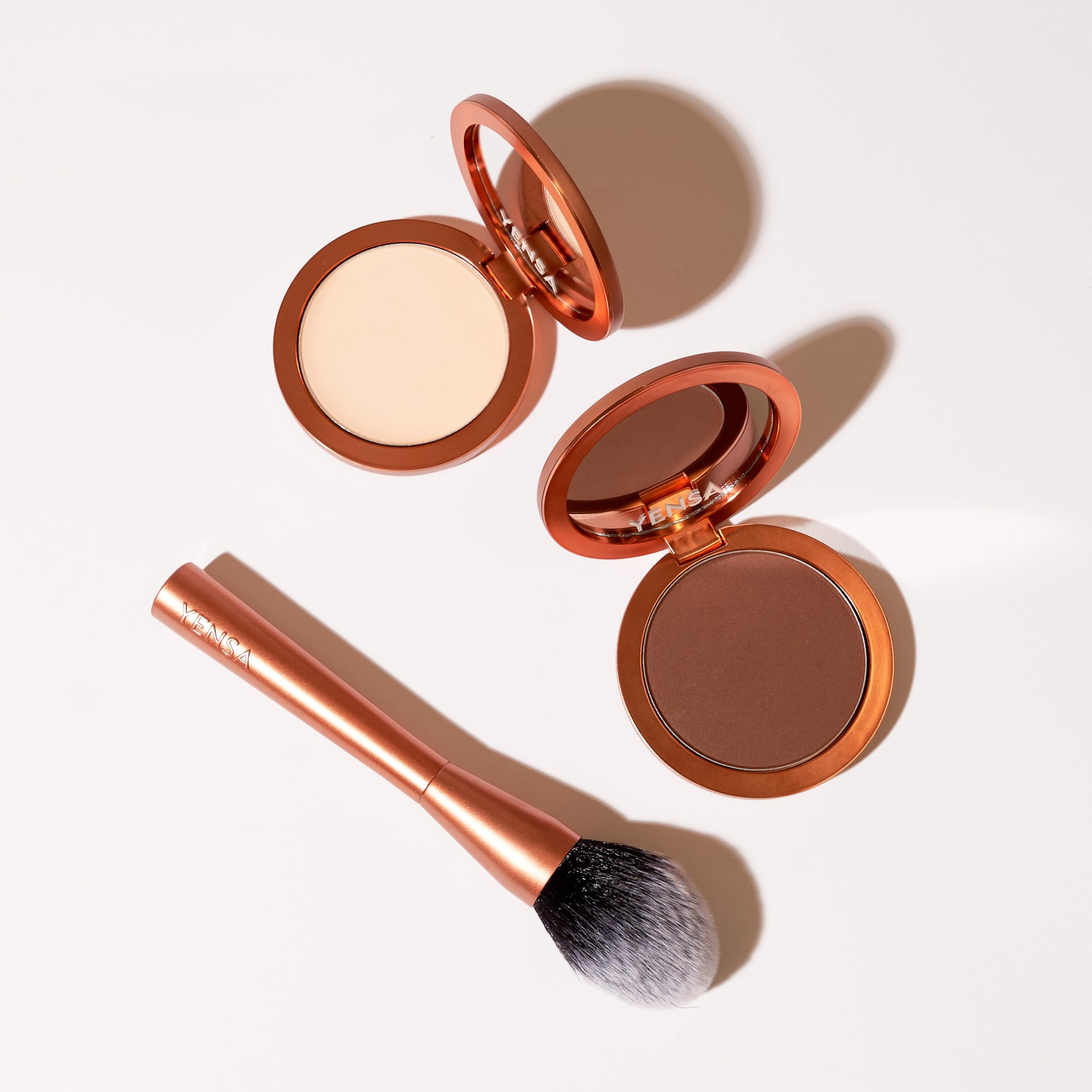 YENSA Tan 1 application routine with powder brush for oil control.