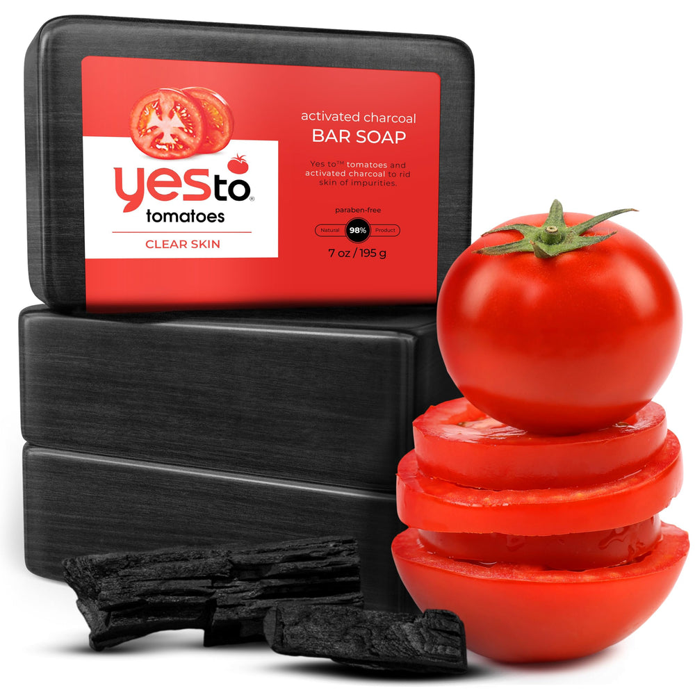 Yes To Tomatoes charcoal bar soap on a clean surface, ideal for daily detox cleansing.