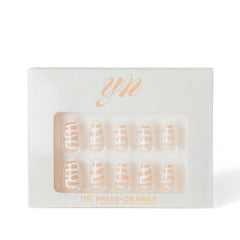 YN Young Nails press-on nails in oval shape on hand for a quick, stylish upgrade