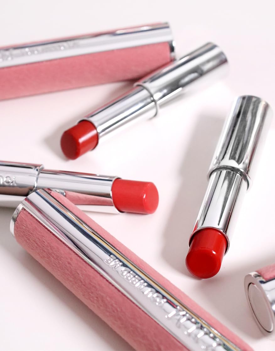 YNM Candy Gloss Balm bottle highlights plant oils for moisture