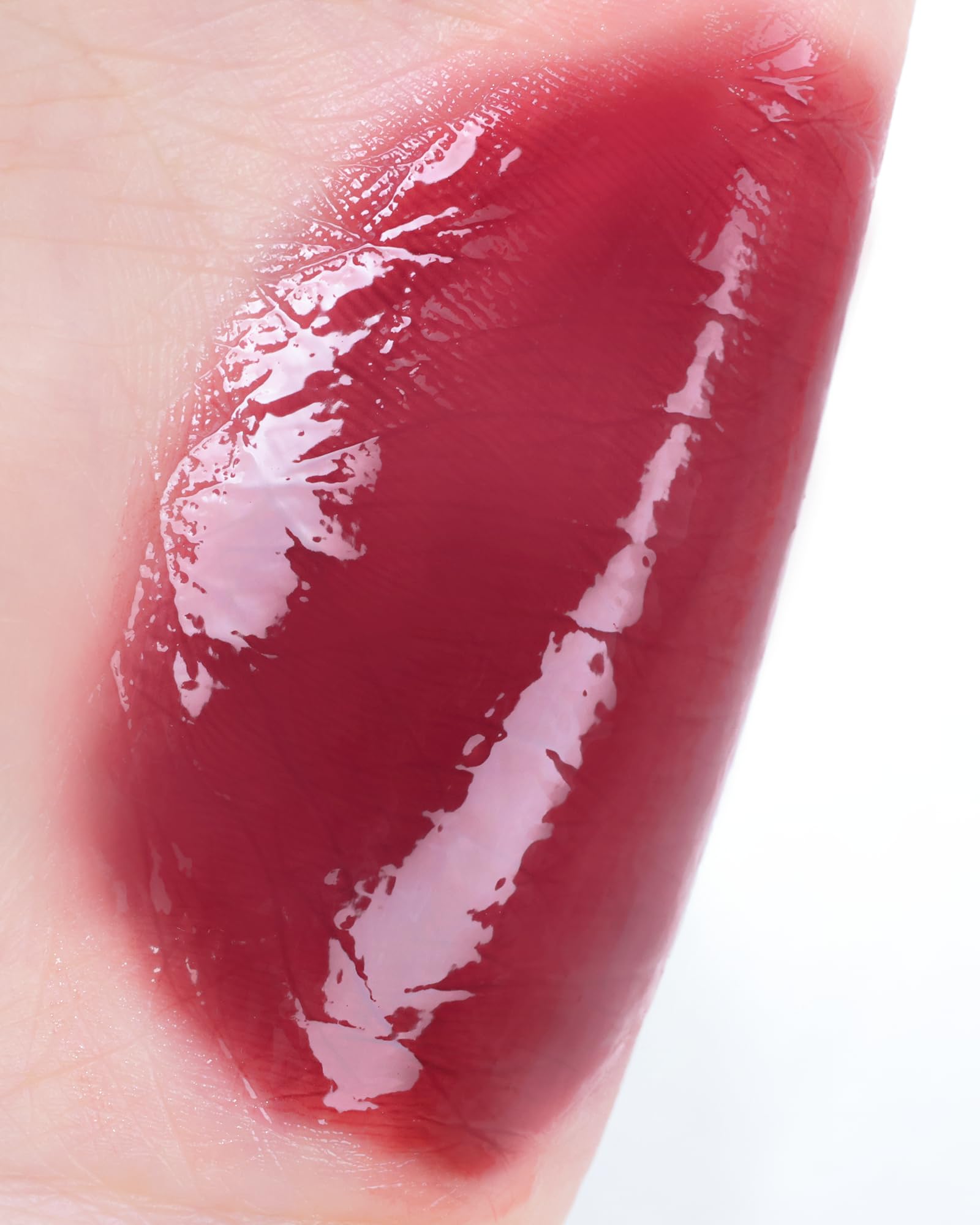 YNM Heart Jelling Tint Plum Jelling swatch on lips showing vivid color payoff