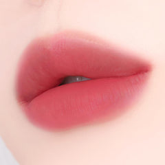 YNM Matte Veil Tint angled applicator contours lips for precise, even color