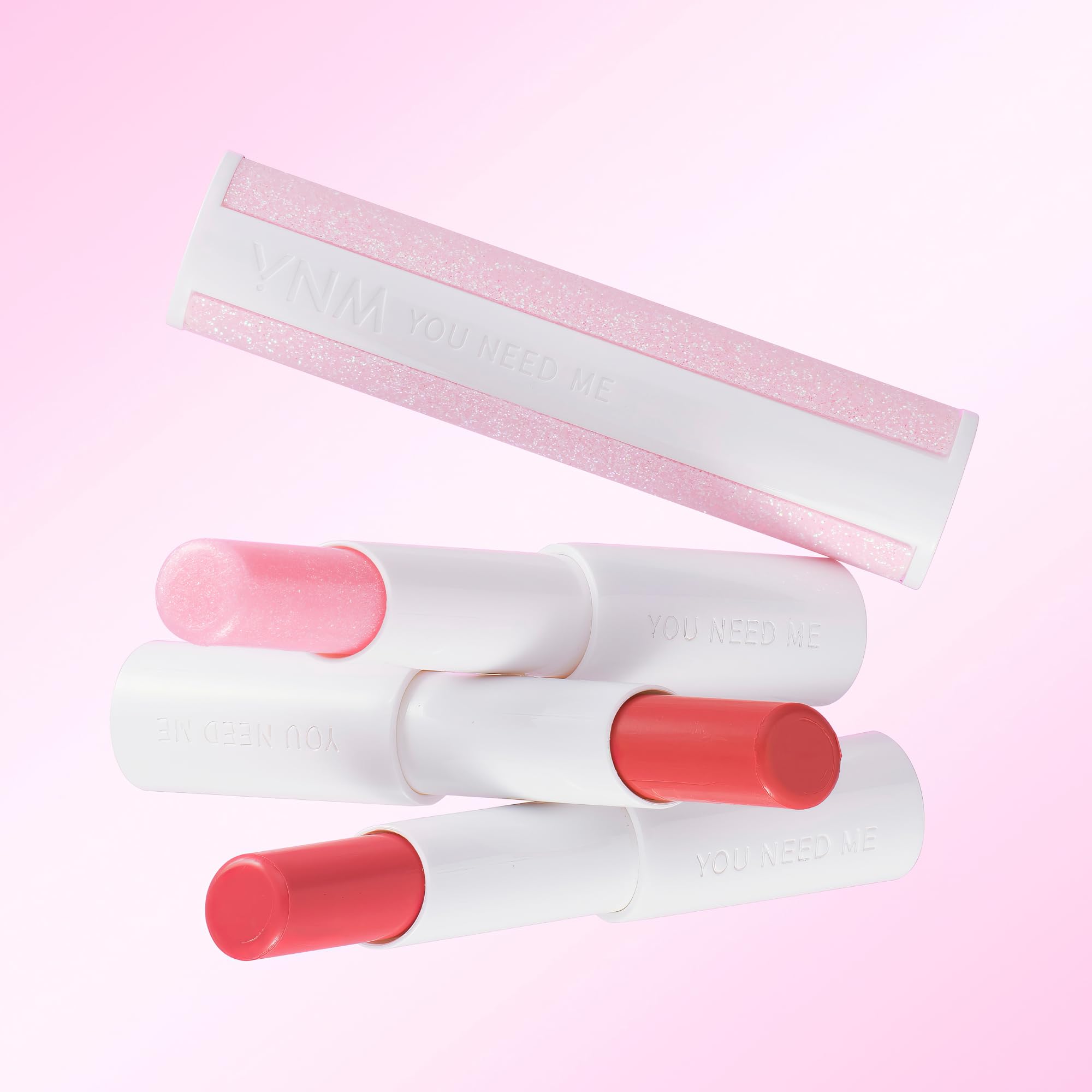 YNM Peach Soda lip plumper close-up shows a glossy finish.