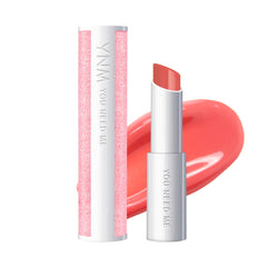 YNM Ultimate Lip Plumper Peach Soda tube glows with moisturizing gloss.