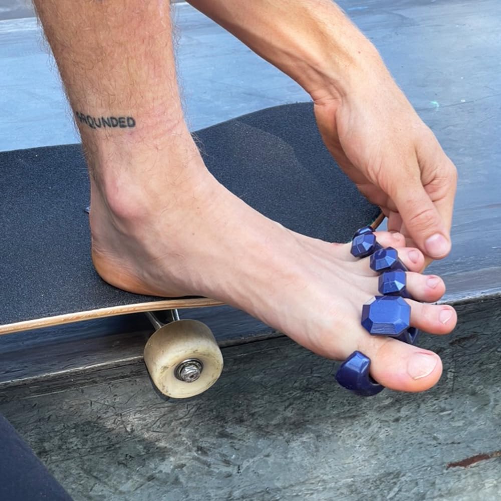 YogaToes Gems for Men in metallic blue aid post-workout recovery with gentle stretch.