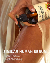 Close-up of pour spout on Yoken jojoba oil bottle.