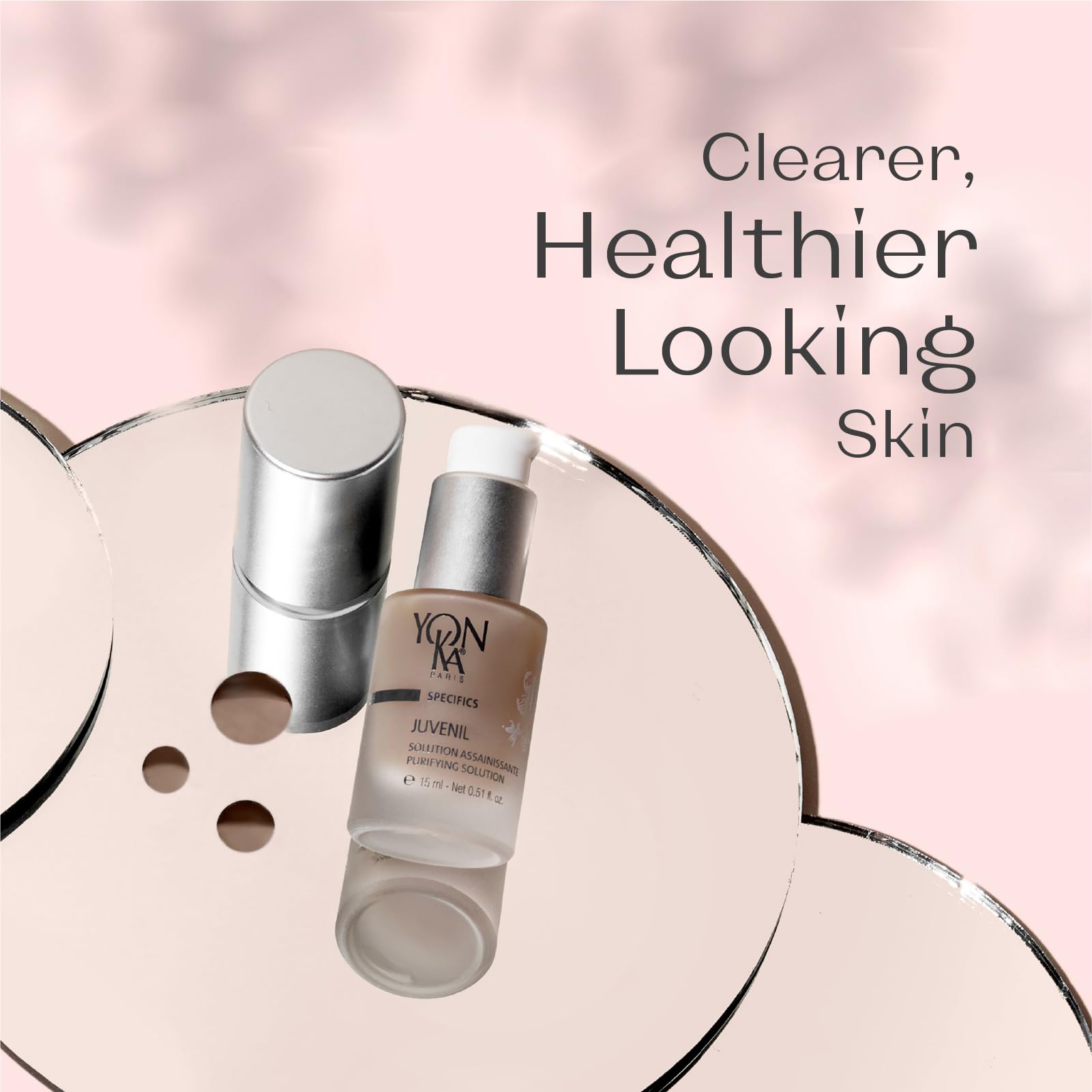 Product close-up with bottle and dropper, highlighting alcohol-free formula.