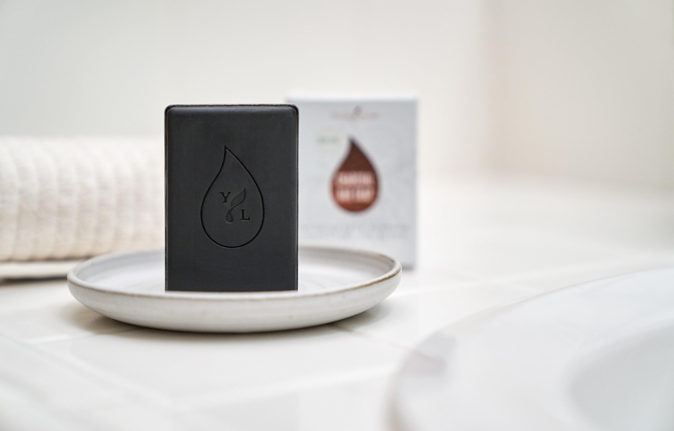 Young Living Charcoal Bar Soap ideal for acne-prone skin routines.