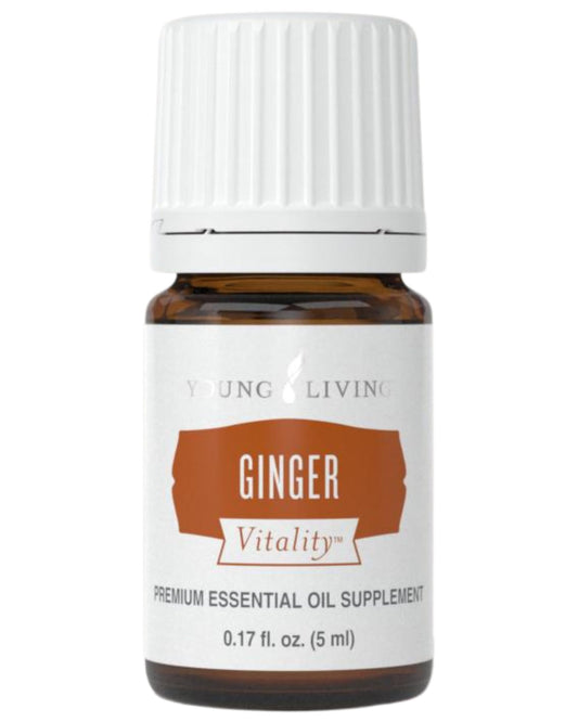 Young Living Ginger Vitality bottle being poured to elevate savory dishes.
