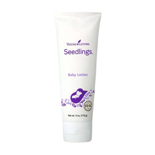 Young Living Seedlings Baby Lotion bottle closeup showing gentle plant-powered care for delicate skin