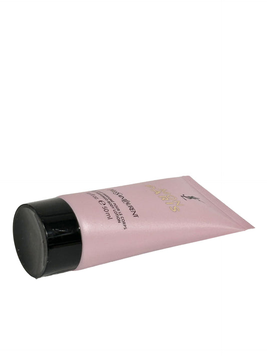 Compact travel-size YSL MON PARIS lotion packaging for on-the-go fragrance and moisture