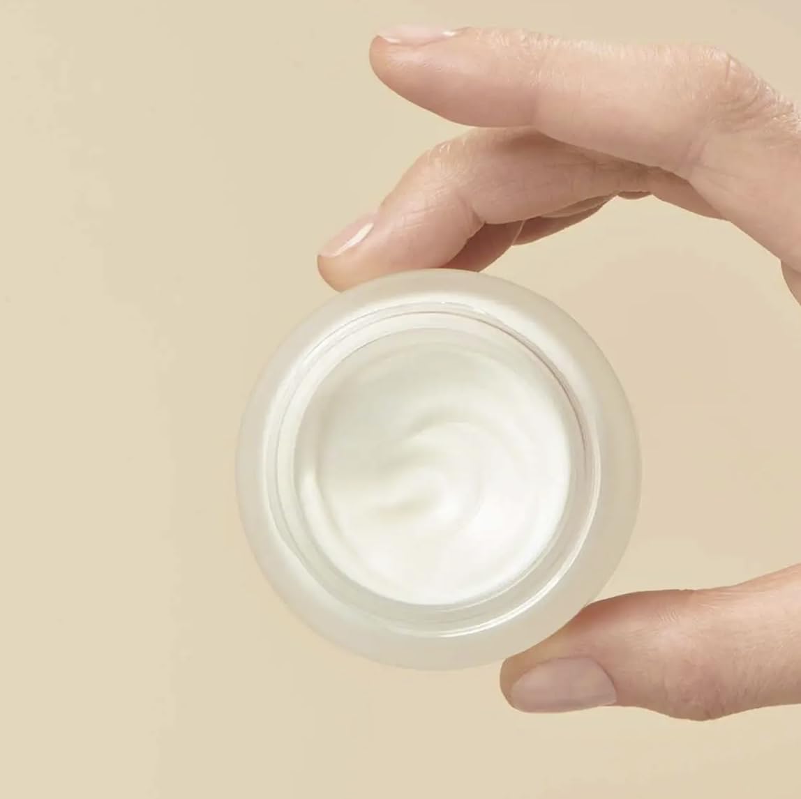 Yves Rocher Complete Anti-Age Night Cream applied with center-to-outside massage for even tone