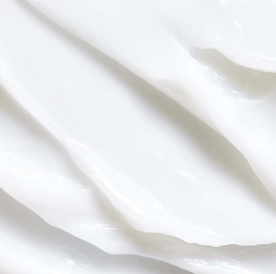 Yves Rocher nourishing conditioner creamy texture highlights deep hydration for damaged hair.