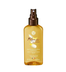 Yves Rocher Monoï de Tahiti dry oil on arm demonstrating quick absorption.