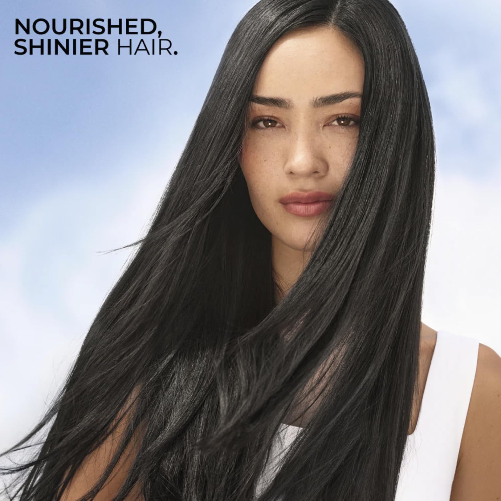 Yves Rocher Raspberry Shine Hair Vinegar liquid glistens, suggesting buildup-free, light hair
