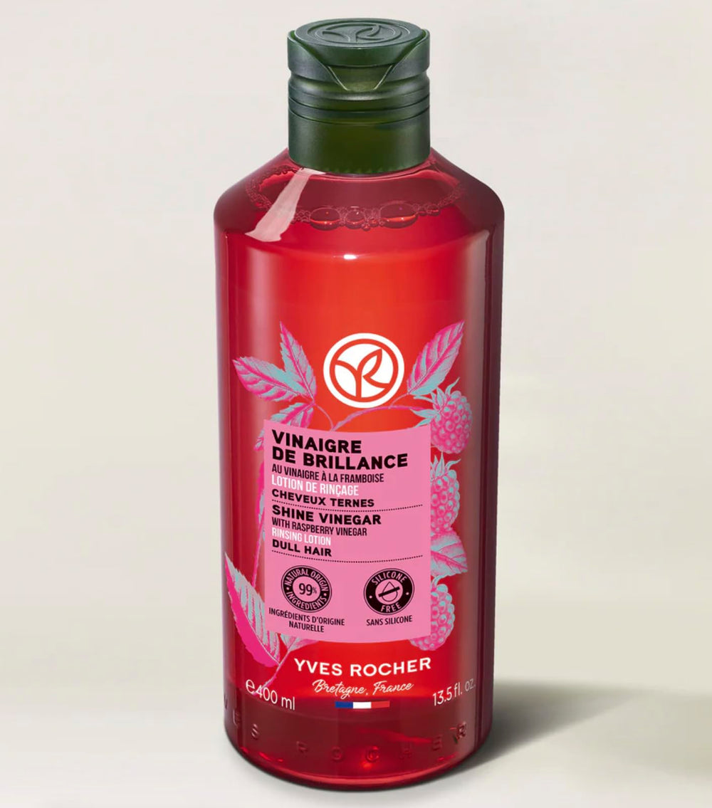 Yves Rocher Raspberry Shine Hair Vinegar being poured for final rinse