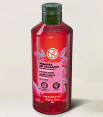 Yves Rocher Raspberry Shine Hair Vinegar being poured for final rinse
