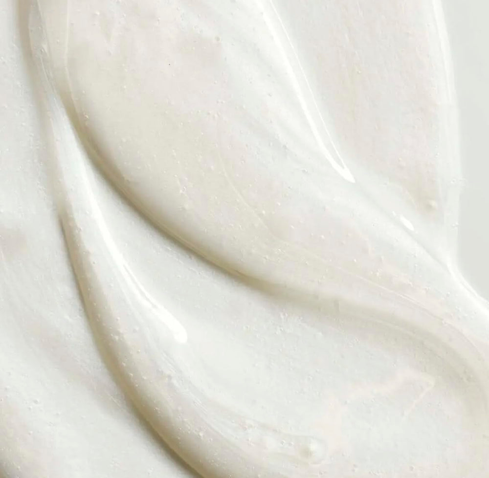 Yves Rocher shampoo jojoba oil texture close-up showing lightweight hydration for hair.